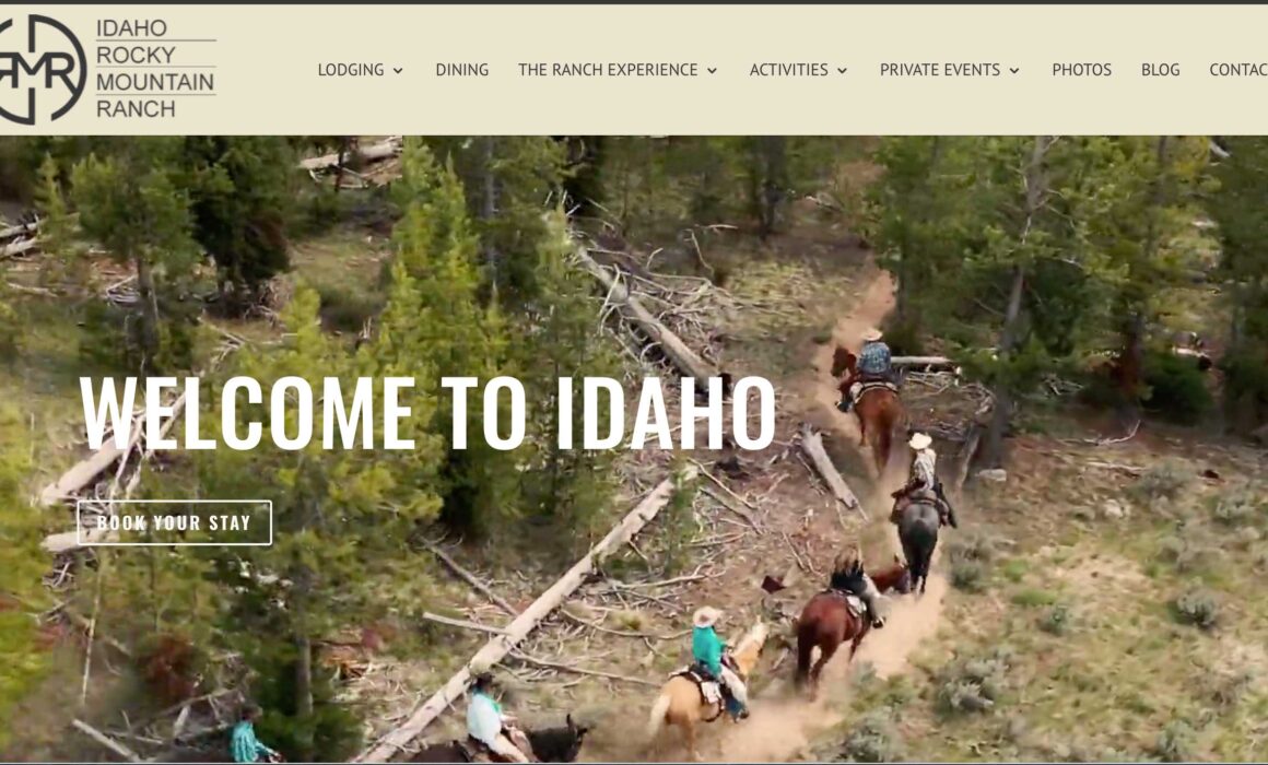 A screenshot of the Idaho Rocky Mountain Ranch website homepage with guests riding horses in an aerial view.